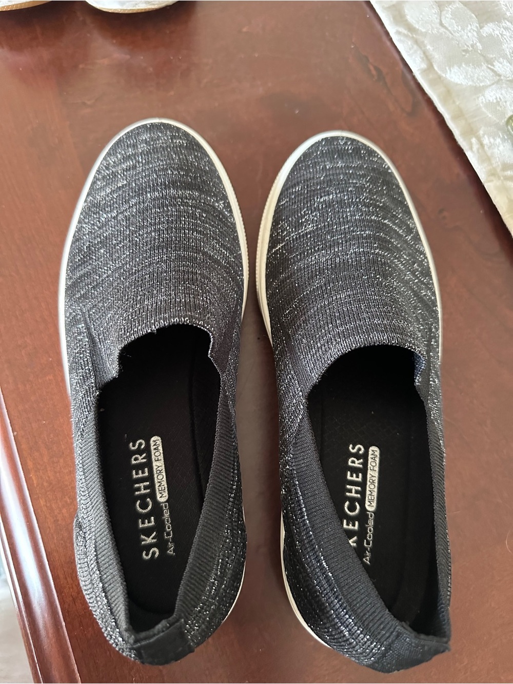 Skechers Women's Black Slip-On Knit Sneakers with White Sole